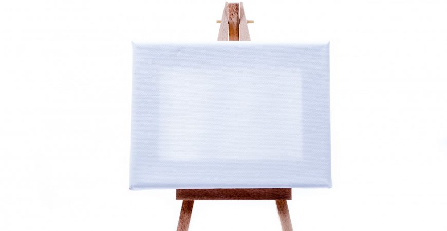 small easel with a blank canvas